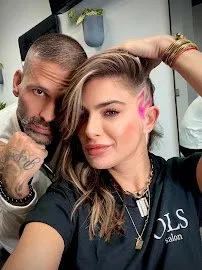 Orlando with a client at the studio